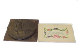 Nine WWI needlework postcards and a bronze death plaque,