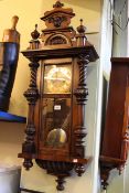 Victorian walnut cased Vienna wall clock having brass and copper dial