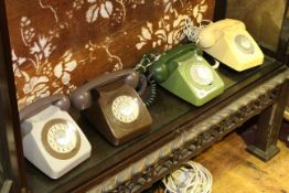 Four vintage telephones