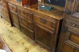 Antique oak dresser base having three frieze drawers above two central drawers flanked by two