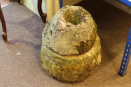 Antique weathered stone quern