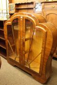1930's walnut two door china cabinet and two cast metal standard lamps (3)