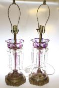 Pair of lustre drop and overlay glass table lamps with brass fittings
