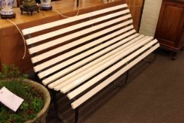 Wrought iron and wood slat garden bench,