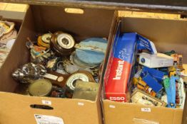 Two boxes of model vehicles, barometers, tape measures, postal scales,