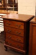 Four drawer hardwood chest on cabriole legs