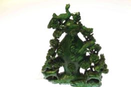 Chinese boldly carved malachite bottle 'vase', on a wooden stand,