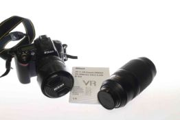 Niko D90 camera with two lenses, AF-S Nikkor 70-300mm/AF-S Nikkor 18-105mm, charger,