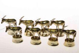 Fine harlequin set of eight silver gilt menu holders, comprising four London 1987,