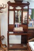 Late 19th/early 20th Century carved oak mirror back hallstand