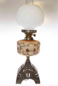 Cast based oil lamp with painted glass reservoir and opaque shade