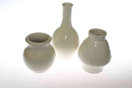 Three white Moorcroft vases