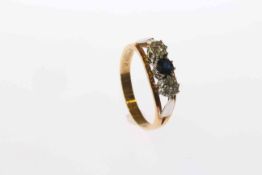 18 carat gold three-stone sapphire and diamond ring,