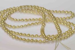 Very long freshwater round pearl necklace