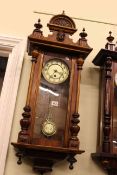 Victorian walnut cased Vienna wall clock having enamelled dial