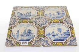 Set of four Delft tiles with sailing boat scenes