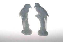 Two John Beswick white bisque parrots