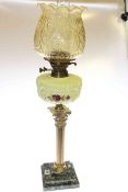 Brass corinthian column oil lamp on marble stepped base with painted glass reservoir and moulded