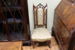 Victorian mahogany twist pillar nursing chair on cabriole legs