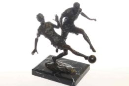 Bronze of footballers,