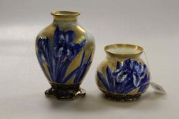 Two Royal Doulton flow blue and gilded iris vases,