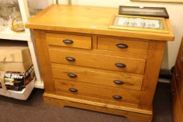 Golden oak chest of two short above three long drawers