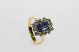 18 carat long cushion sapphire and brilliant diamond cluster ring,