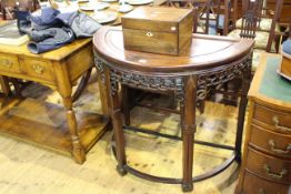 Carved Chinese hardwood demi lune table