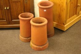 Three terracotta chimney pots