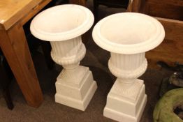 Pair cast campana style garden urns and stands
