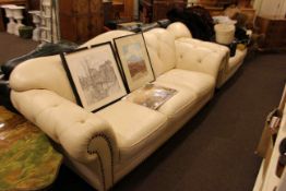 Pair deep buttoned ivory leather three seater and two seater Chesterfield settees