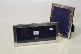 Two sterling silver photograph frames