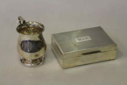 Silver cigarette box and silver christening tankard (2)