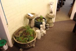 Collection of garden stoneware including two bird baths, three planters, three figures,