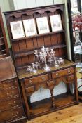 Neat period style oak potboard dresser and rack,