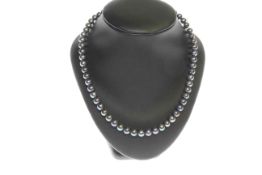 Black pearl necklace with silver clasp