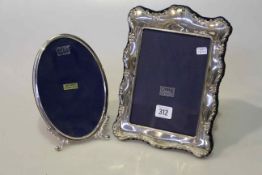 Carrs silver photograph frame and a sterling silver frame (2)