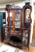 Ornate Victorian mahogany bow front centre parlour cabinet on cabriole legs,