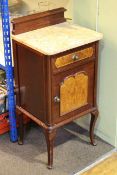 Pair mahogany and walnut panelled door marble topped bedside cabinets