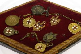 Collection of five 9 carat gold medals, two silver medals and two first world war medals,