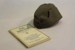 German side cap and copy of Das Inner Reich,