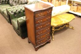 Slim mahogany serpentine front chest of six drawers