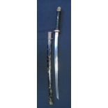 **A JAPANESE W.W.II SWORD (KATANA) with curved single-edged blade with uneven hamon, tang pierced