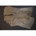 **THE FOREPART AND SIDES OF A MAIL SHIRT, PROBABLY OTTOMAN TURKISH OR MOGHUL INDIAN, 17TH/18TH