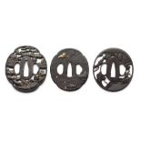 A GROUP OF FIVE JAPANESE SWORD GUARDS (TSUBA), EDO PERIOD the first signed, decorated with a