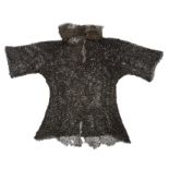 A MAIL SHIRT, PROBABLY OTTOMAN TURKISH MODIFIED TO NORTH AFRICAN USE, 18/19TH CENTURY formed