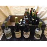 A box of approximately twenty assorted bottles of wine, a bottle of Pastis,