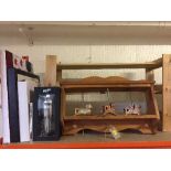 A pine shoe rack, pine coat rack, two wall canvas,