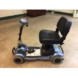 A Freerider Ascot mobility cart with key,