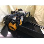 A McCulloch petrol chain saw and a petrol hedge trimmer